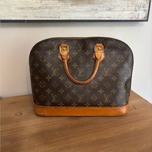 Louis Vuitton Alma Handbag